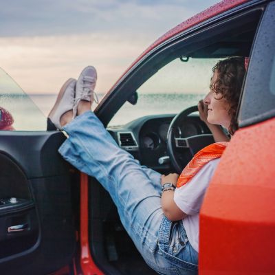 Woman in new car